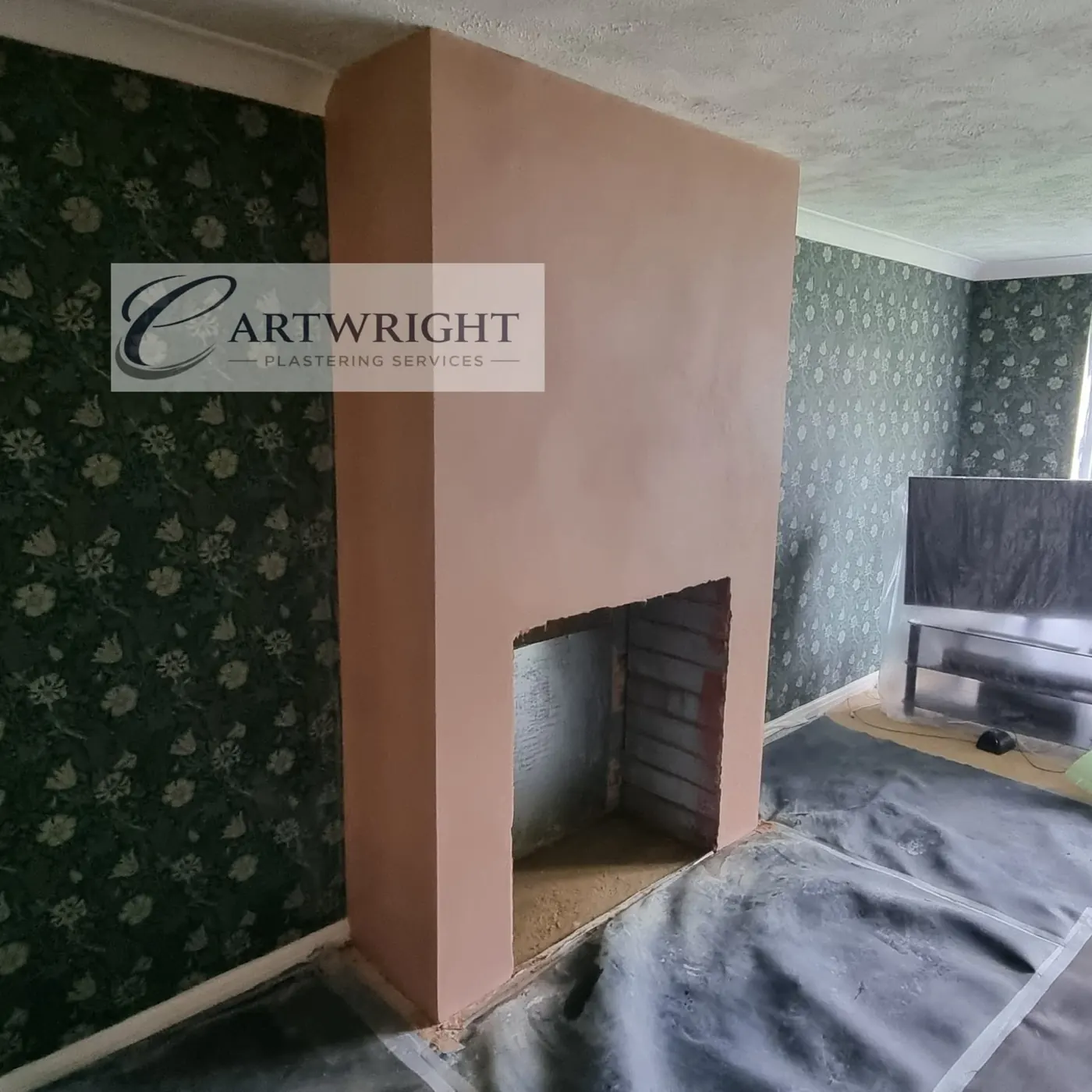 After: the same chimney breast smoothly plastered
