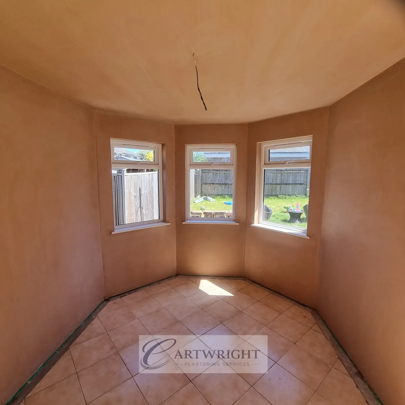 Bay window living room fully re-skimmed