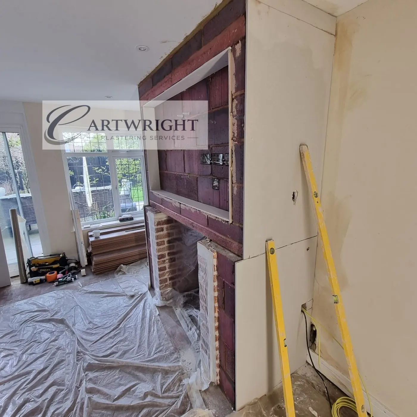 Floor fully covered with dust sheets before plastering begins