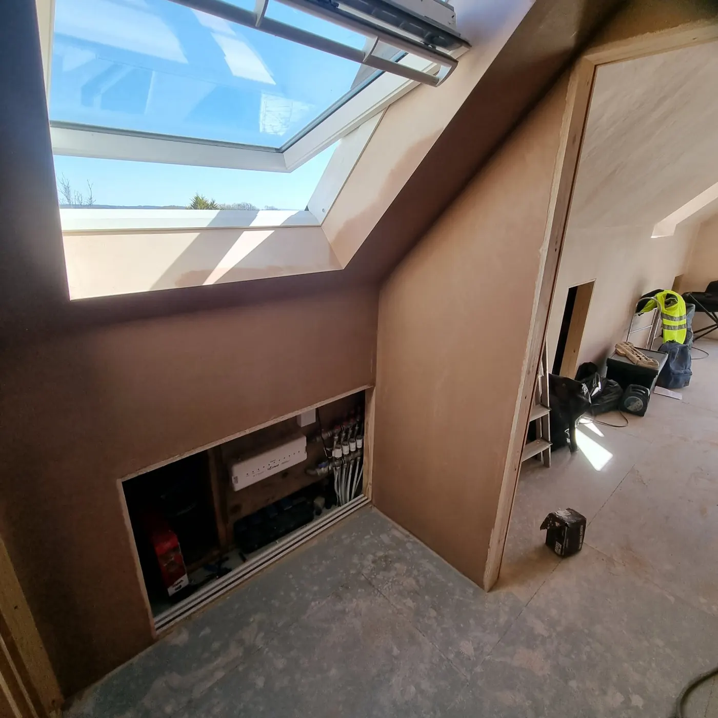 Loft conversion plastered around a skylight
